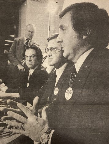 Photo from the Sunday Sun on January 11, 1976 from a press conference about Toronto's bid to acquire the Giants franchise. Seated (L-R): Herb Solway, Paul Godfrey (CBHFM 2024), Don McDougall (CBHFM 2002).